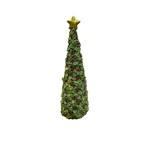 Albero agrifoglio innevato con
