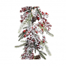 Ghirlanda innevata con bacche rosse